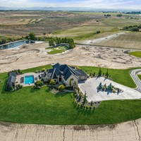 42+ acres with custom home, 2 motocross track, BMX track, large pond with wakeboard pulley, tiki hut, jet ski, go karts, go kart track, well equipped CrossFit gym, indoor basketball court, sand volleyball, pool and pool house, hot tub, golf tee boxes, putting green and so much more!